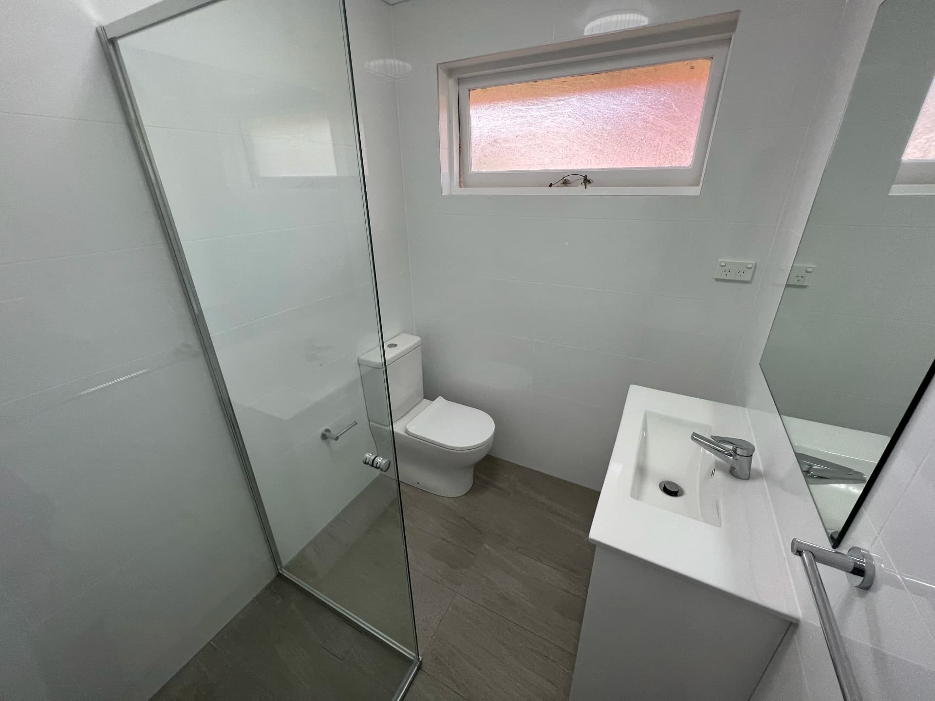 Completed waterproofed bathroom showing professional finish in Sydney apartment