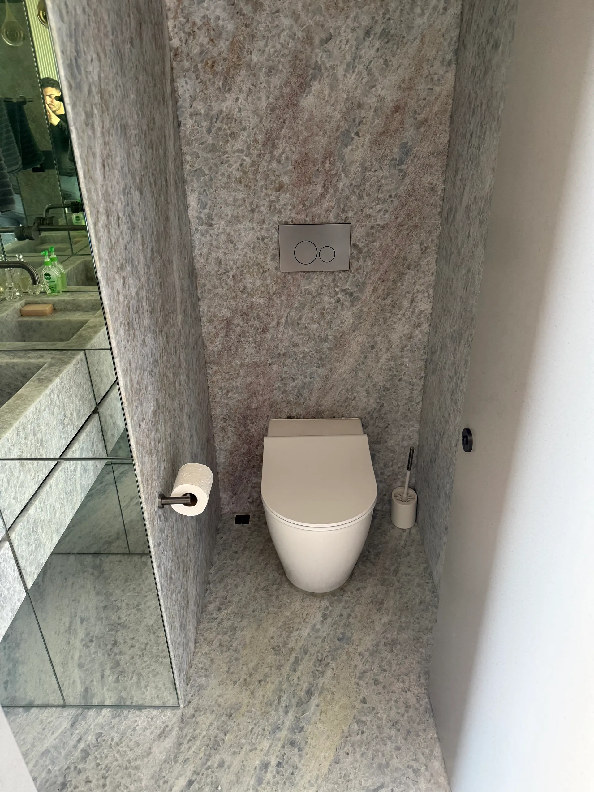 Granite-clad toilet alcove