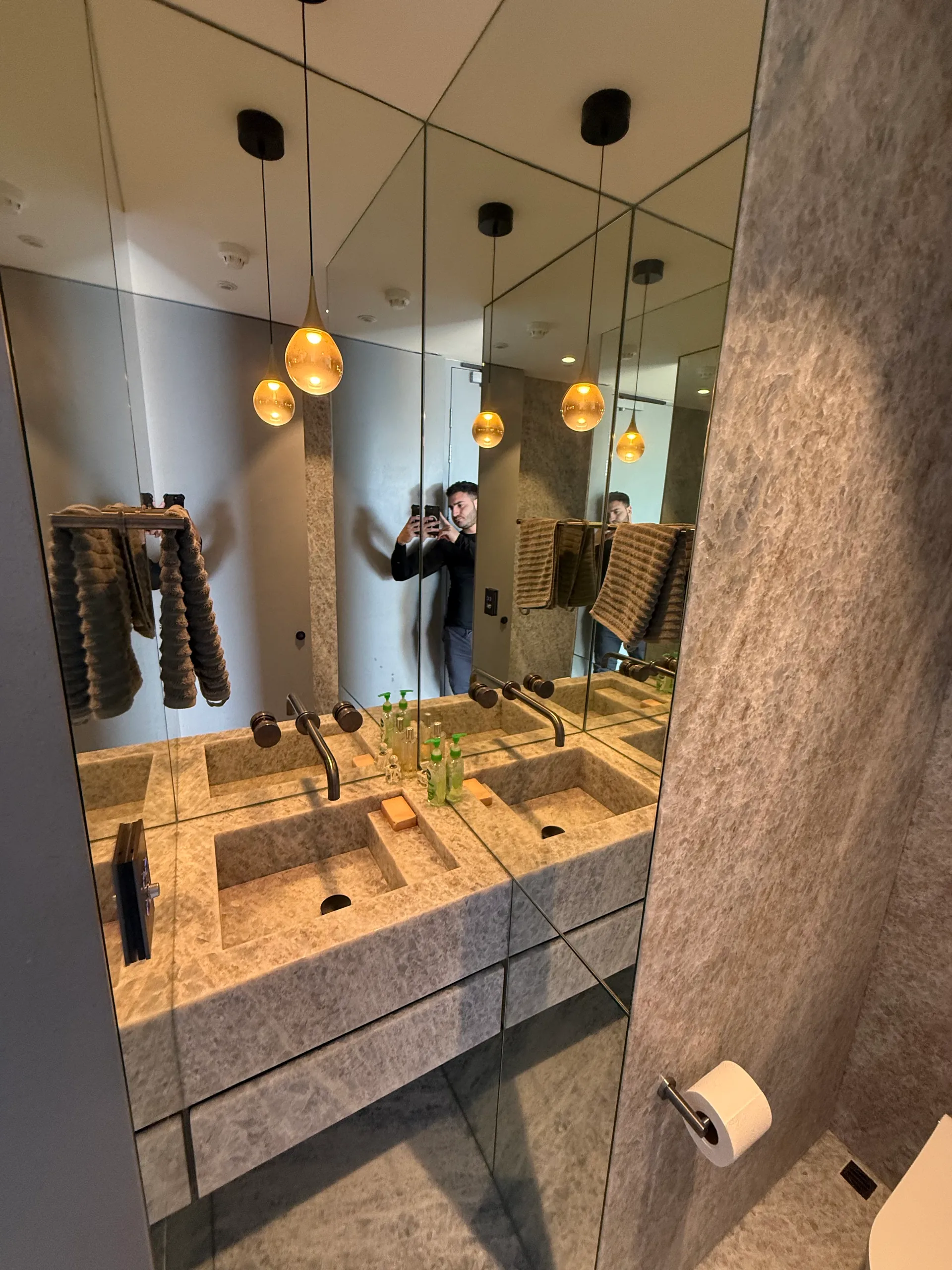 Statement pendant lights above vanity