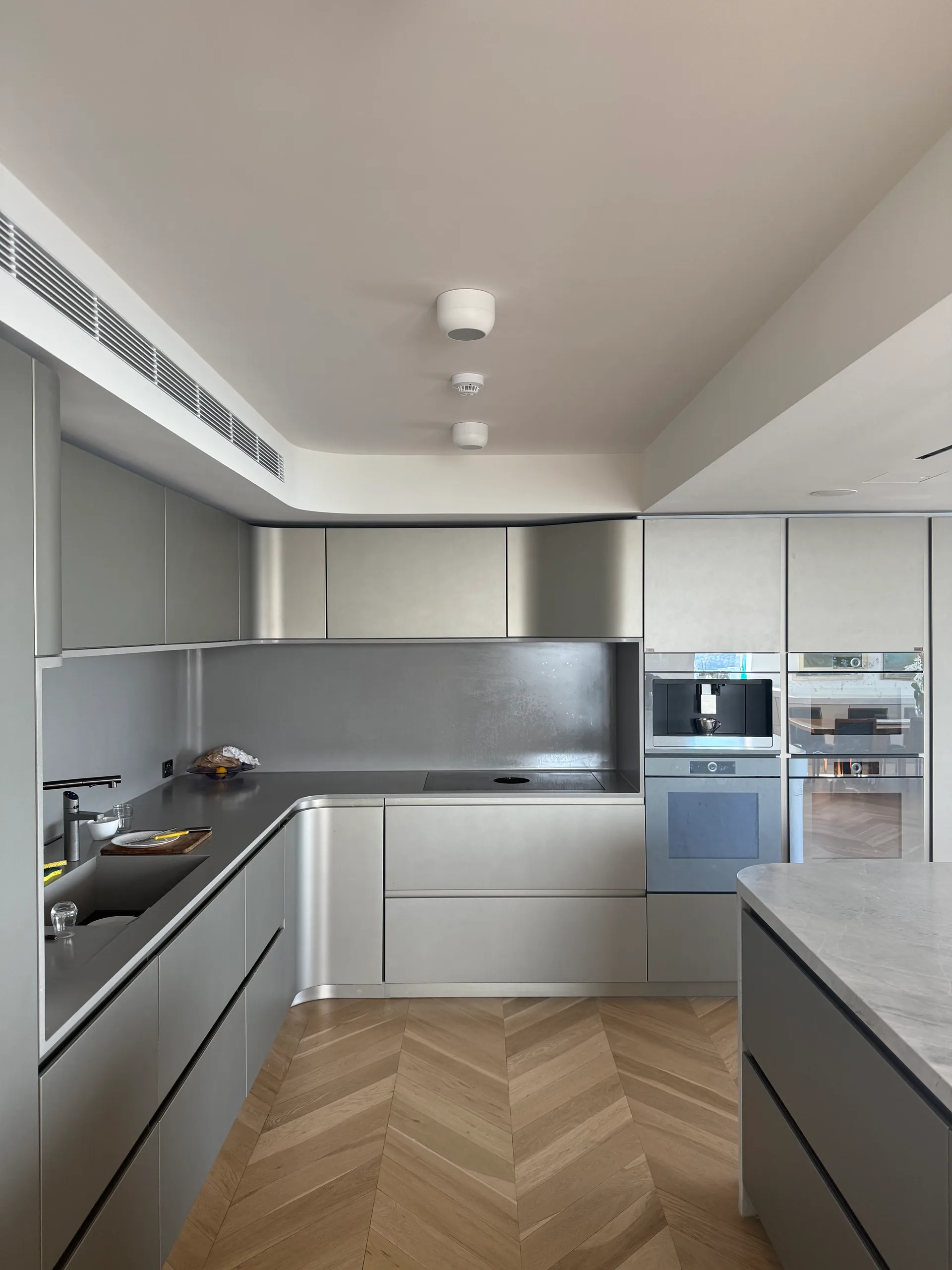 Metallic grey kitchen with island