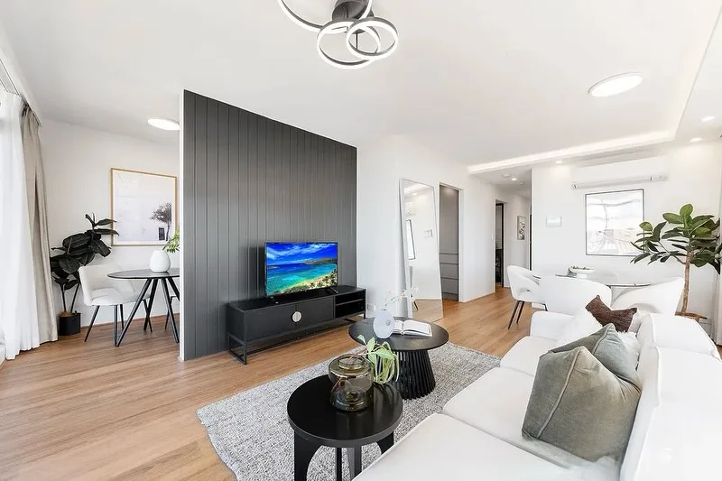 Modern apartment living room with wood floors