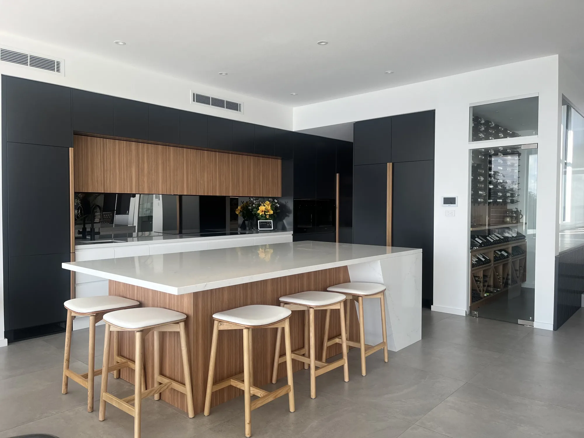 Premium apartment kitchen with island and wine cellar
