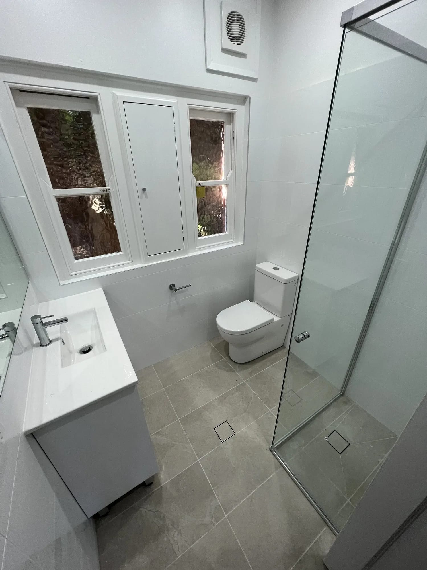 Compact Neutral Bay apartment ensuite with walk-in shower