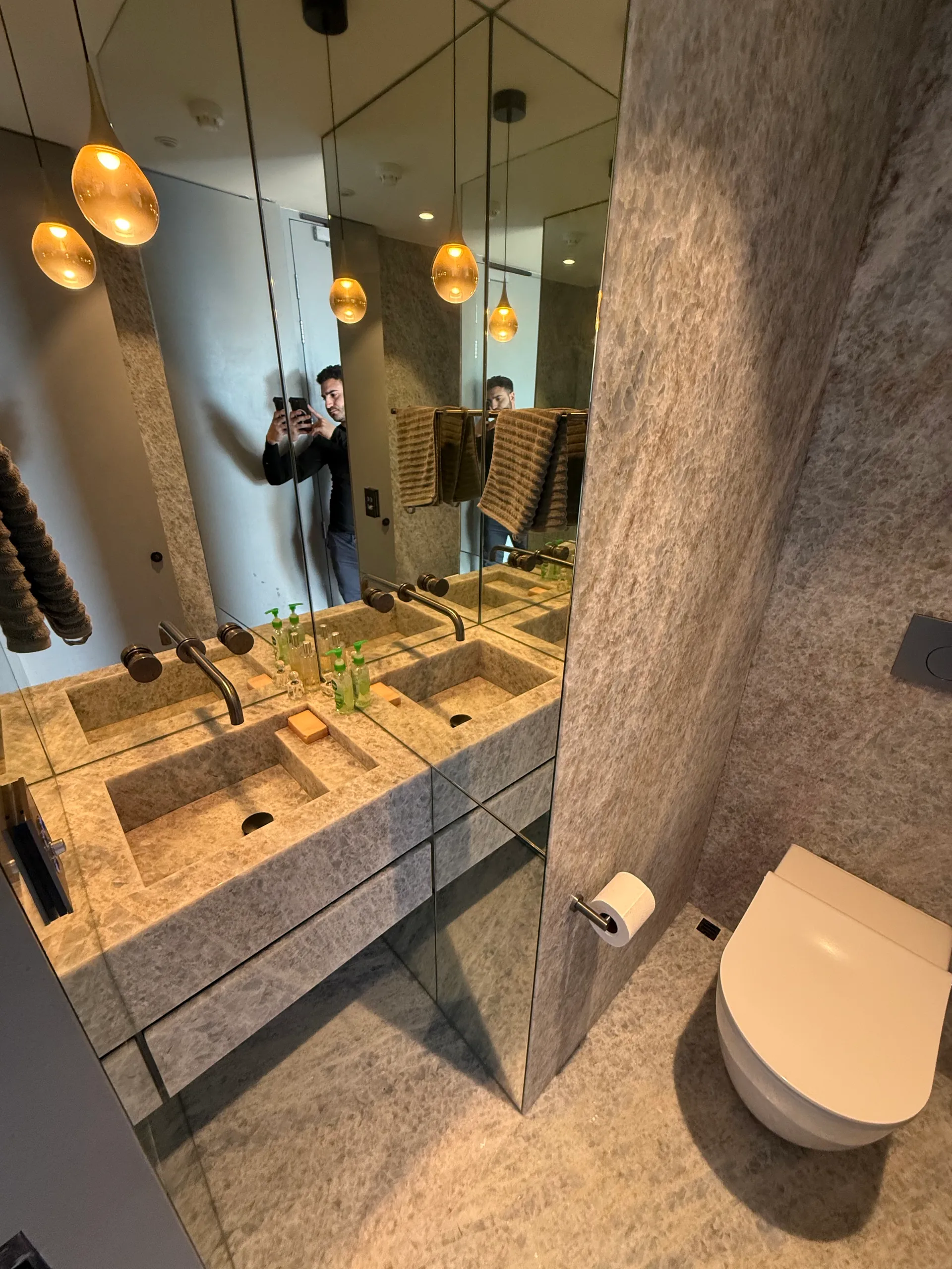 Bathroom mirror reflecting stone details