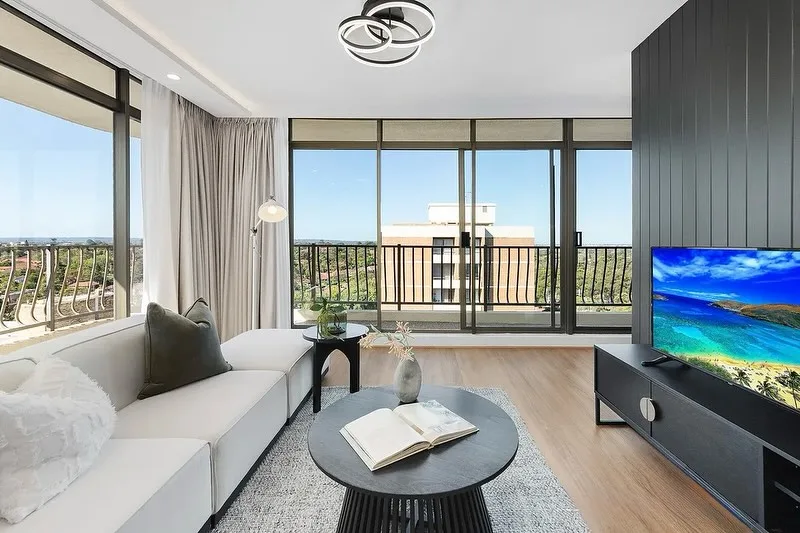Staged living room with city views