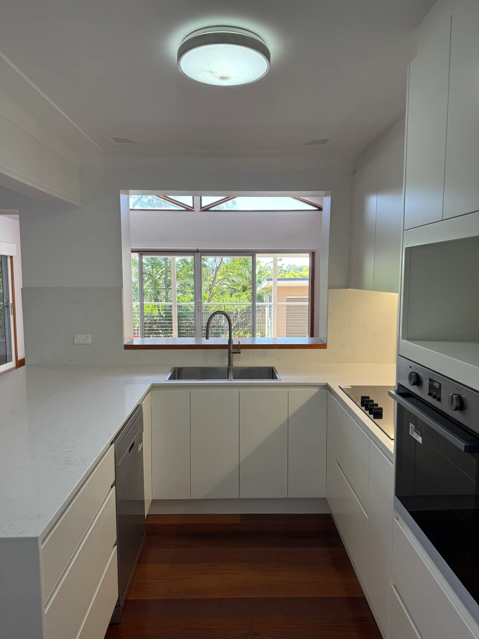 Kitchen sink positioned at window