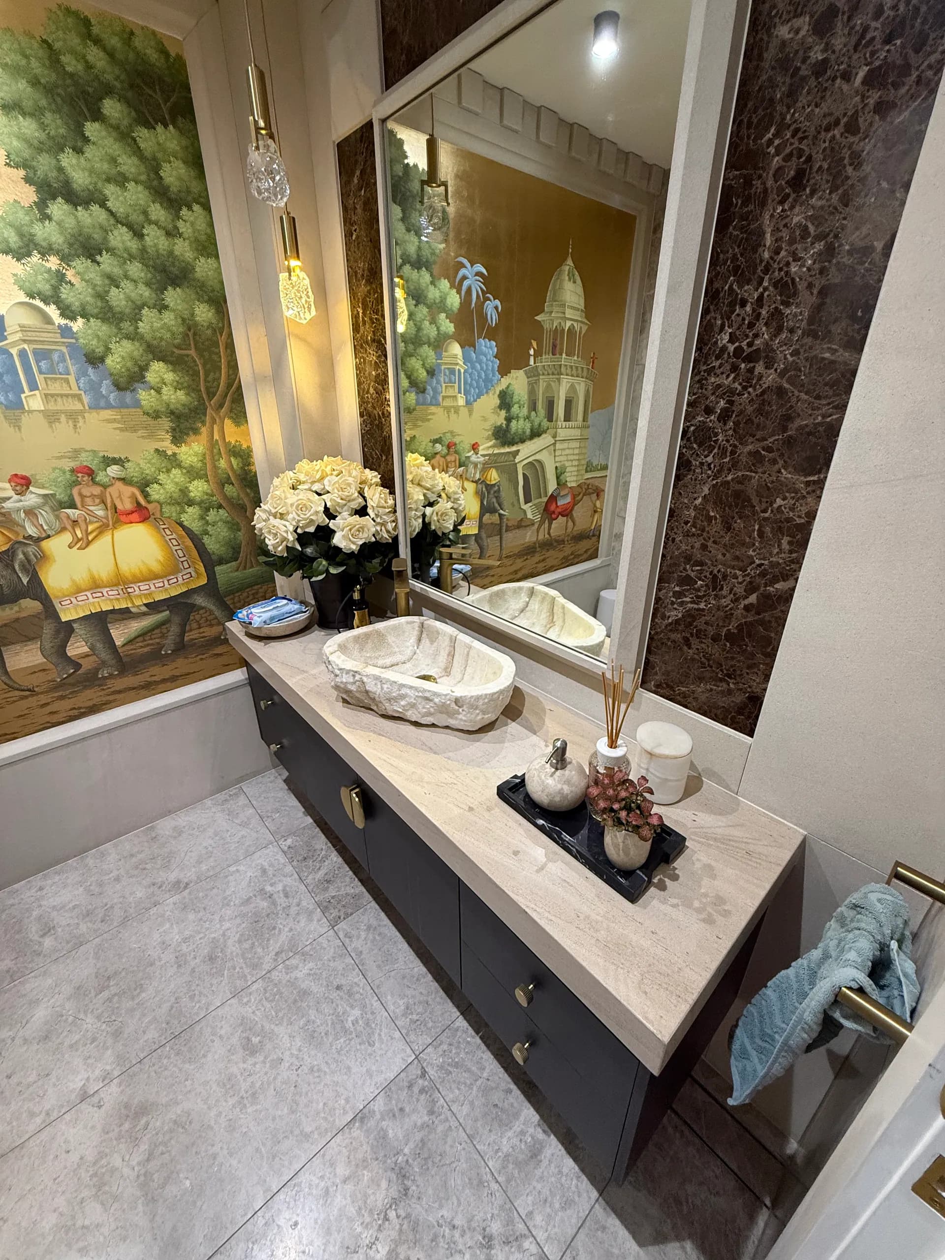 Hand-carved natural stone basin with modern tapware in a Vaucluse bathroom