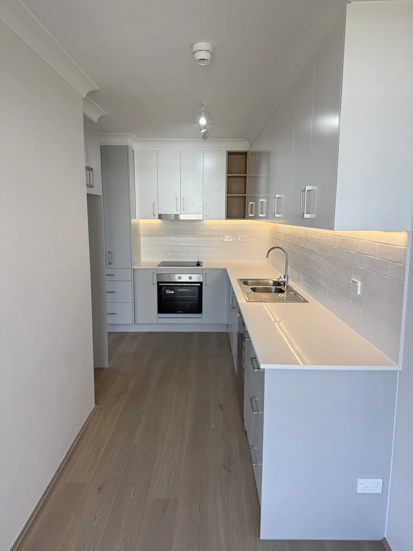 Artarmon Apartment Kitchen in White and Stone