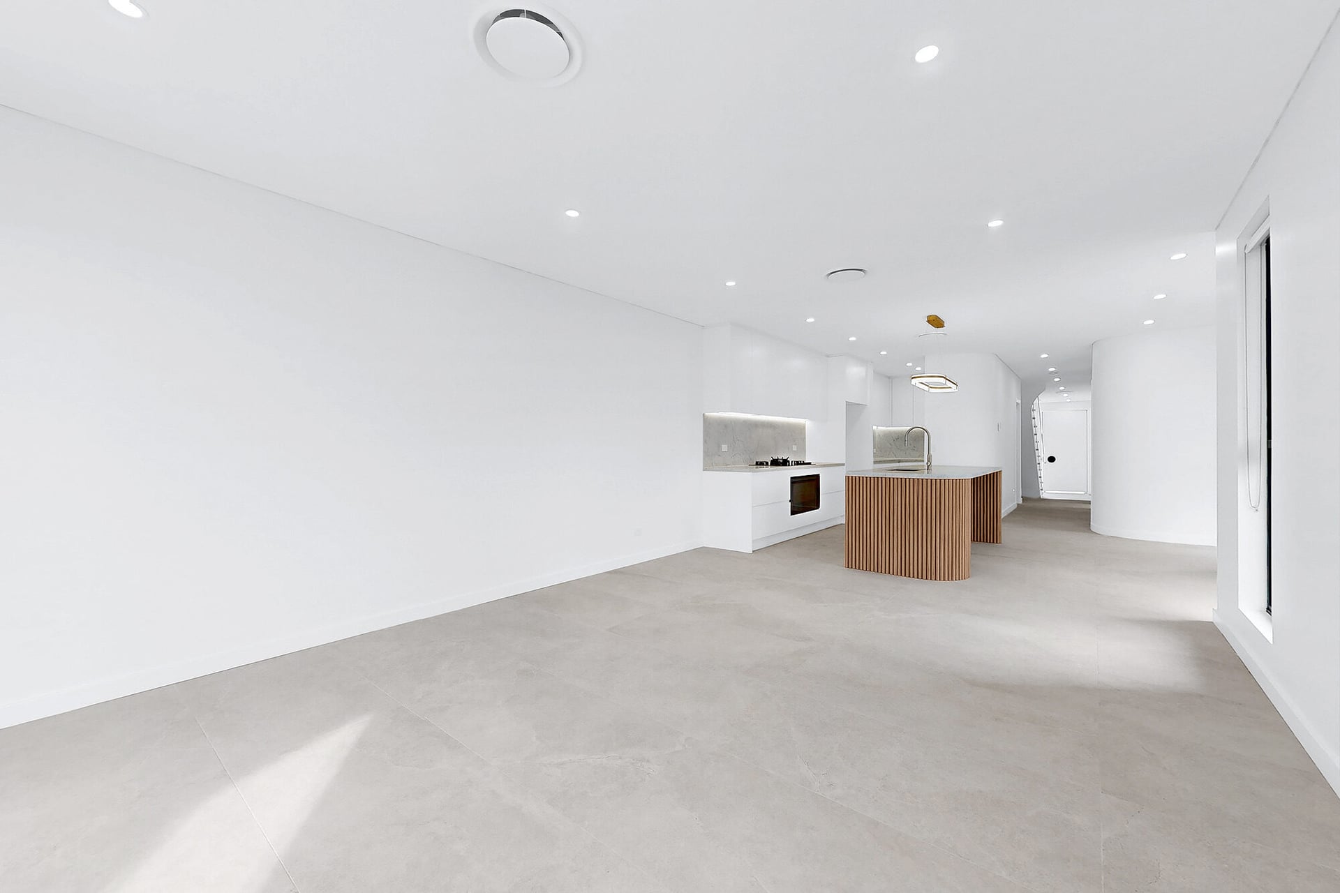 Open-plan living area and kitchen in a renovated Greenacre home