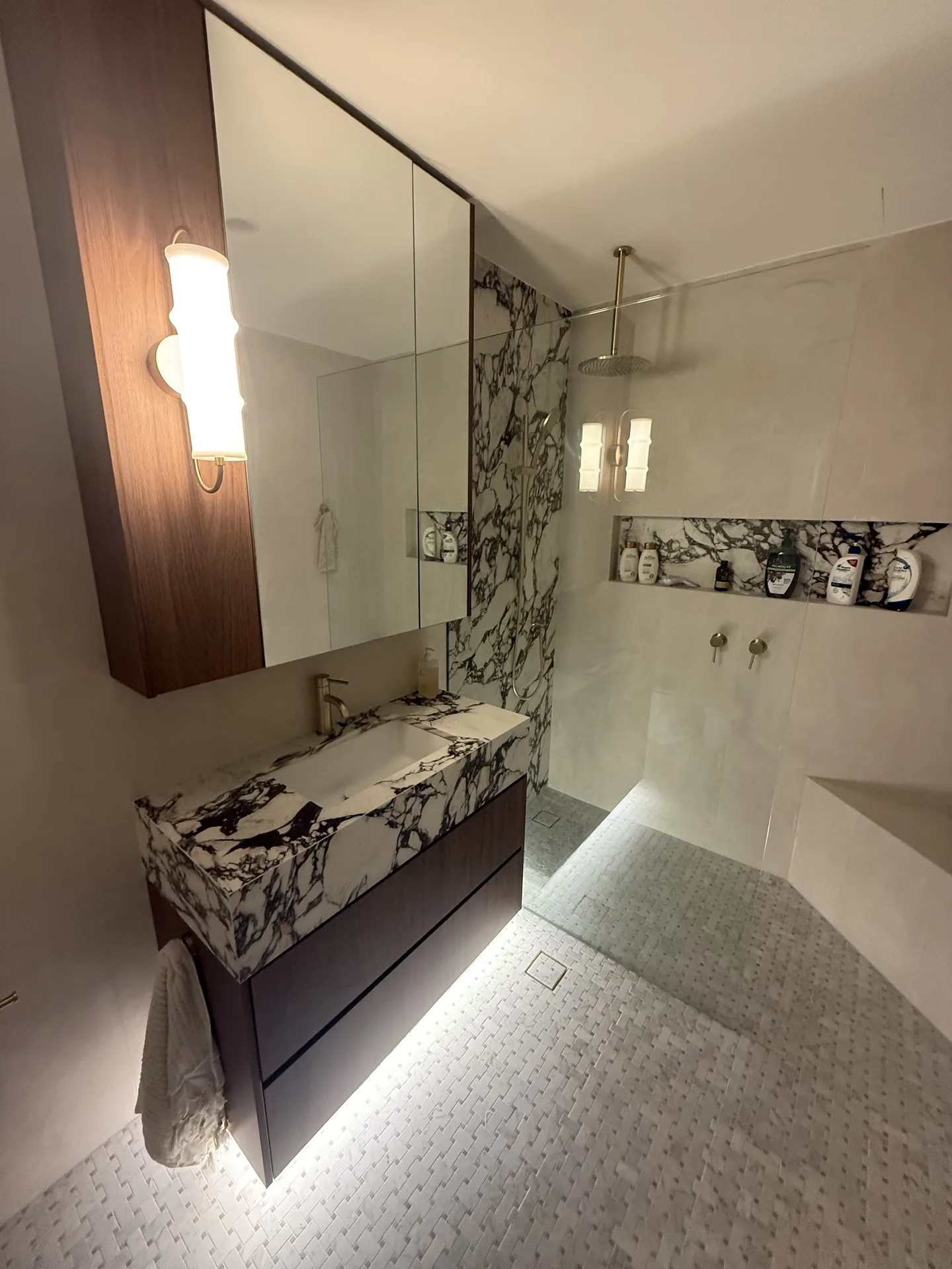 Ensuite with purple-veined marble vanity, dark timber drawers and walk-in shower